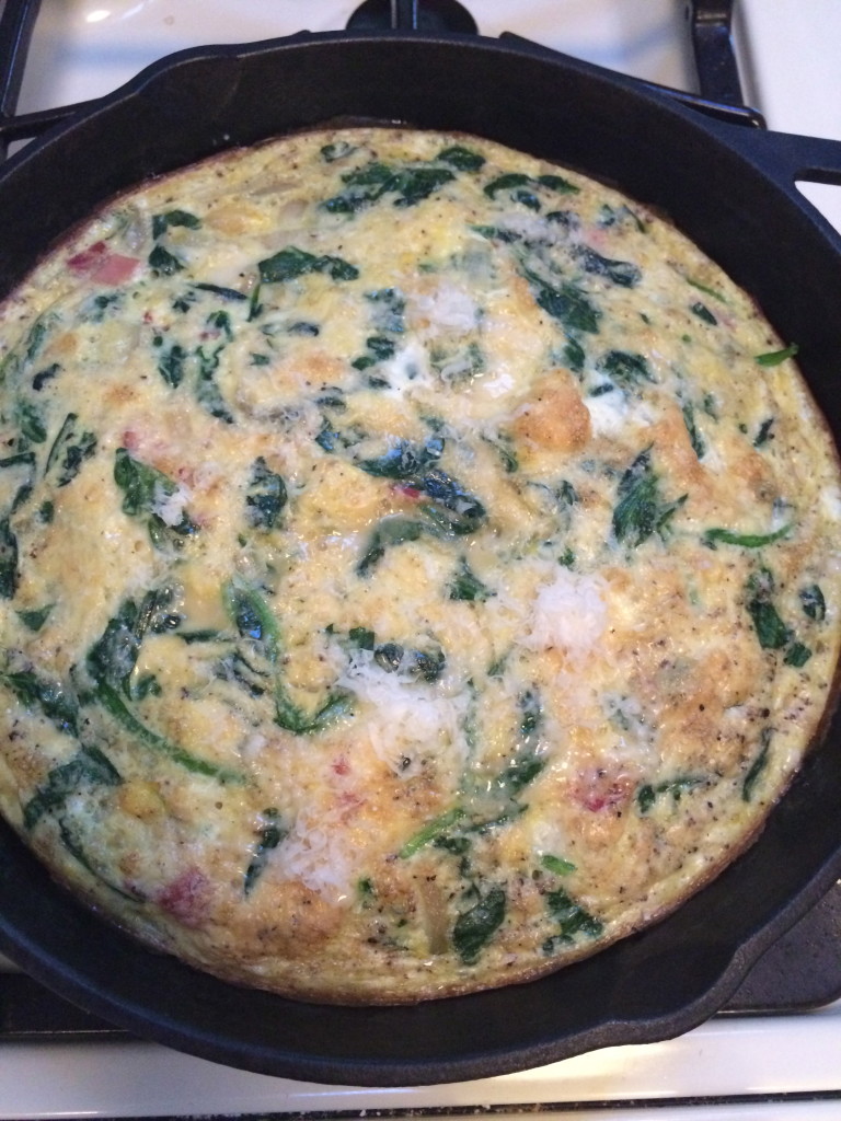 Make sure your frittata is set through and take out of the oven.  Let set for a minute and sprinkle additional cheese on top.  Enjoy!